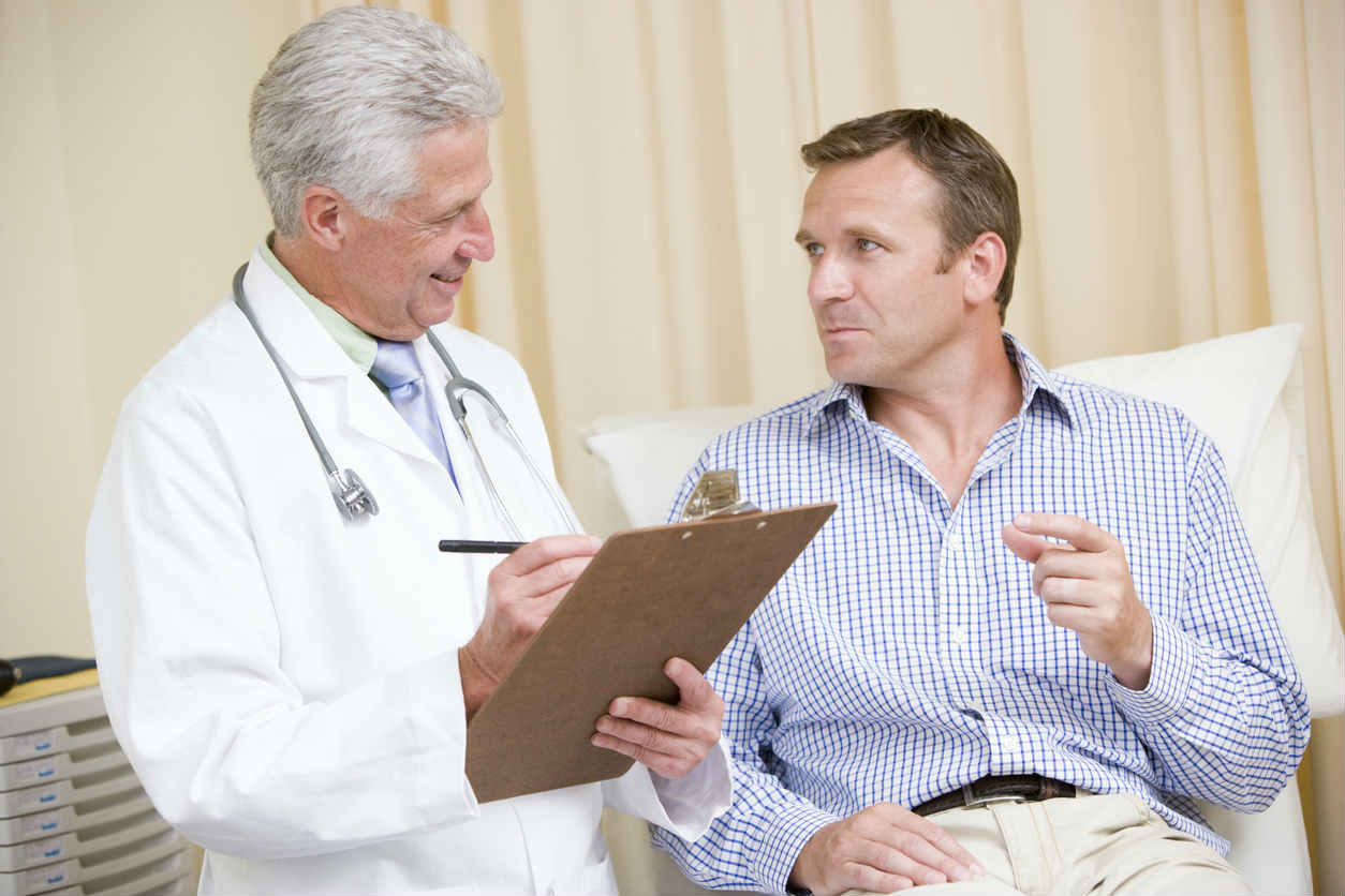 man speaking with his doctor