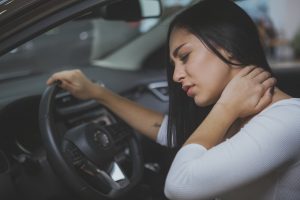 woman with neck pain after car accident